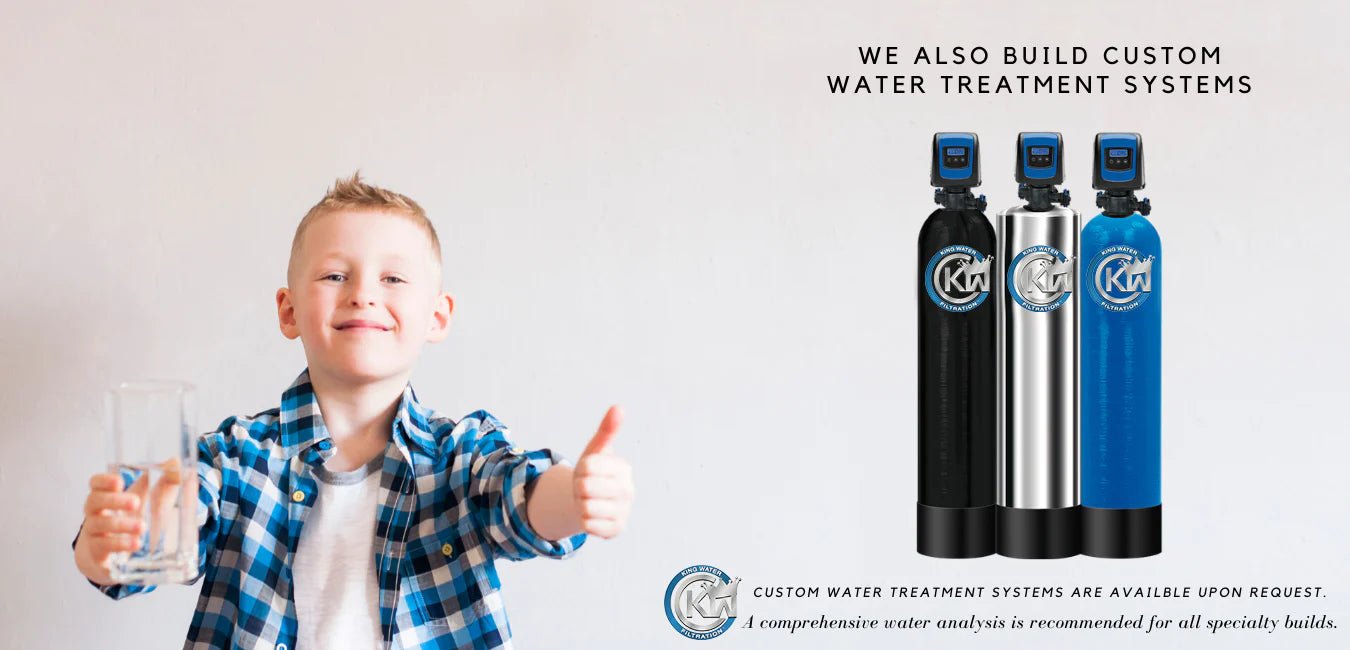 Boy giving thumbs up holding a glass of water with three water filters in the background on display